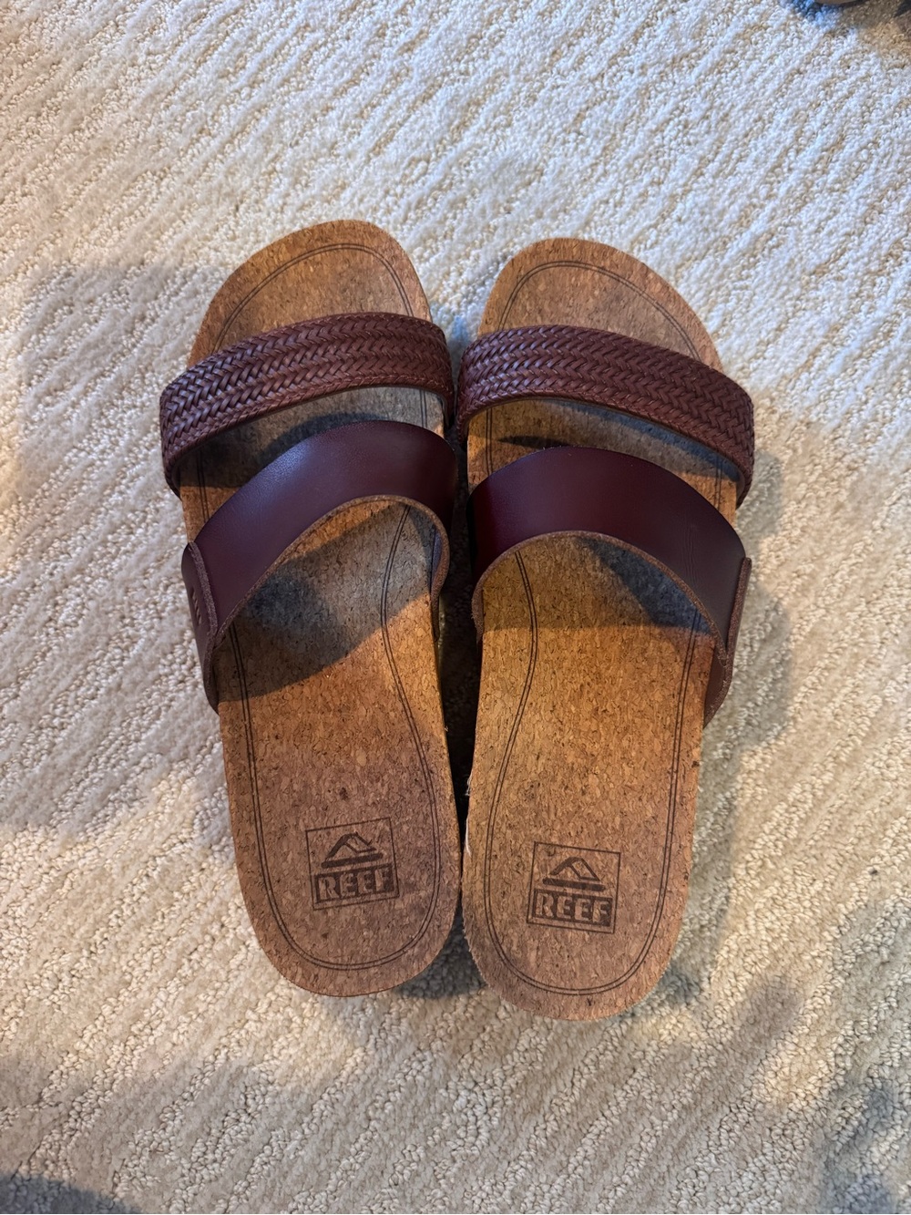 Like new , barely worn Reef sandals.  Brown
